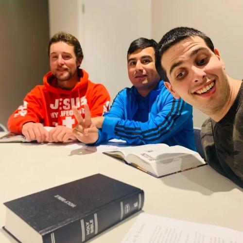Friends staying after to share conversation and Scripture