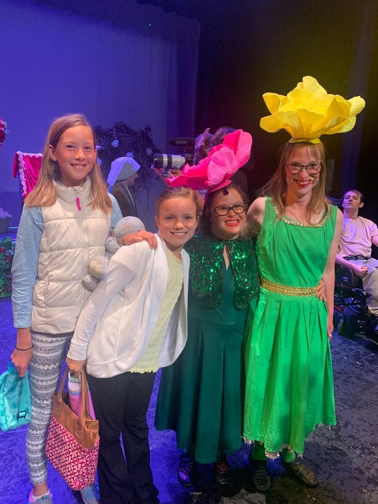 Friends celebrating together after a community event