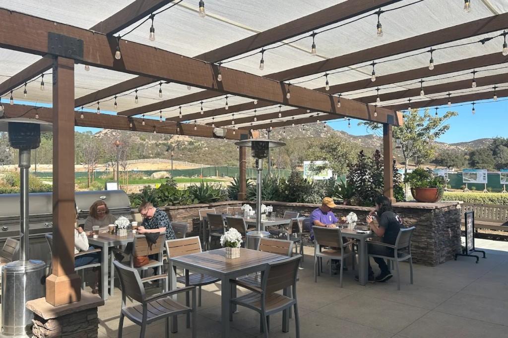 Friends gathering at TERI's outdoor cafe before worship